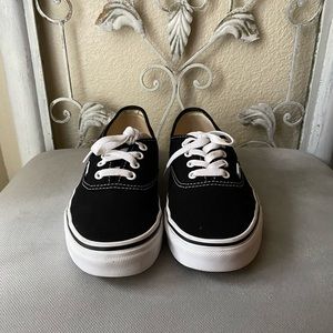 Black authentic Vans. Size 6.5 Womens. Looks new Worn once. Great condition.